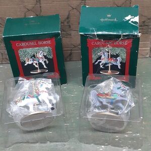 Bundle of 2 1989 Hallmark carousel horse- "Snow" & "Holly" ornaments
